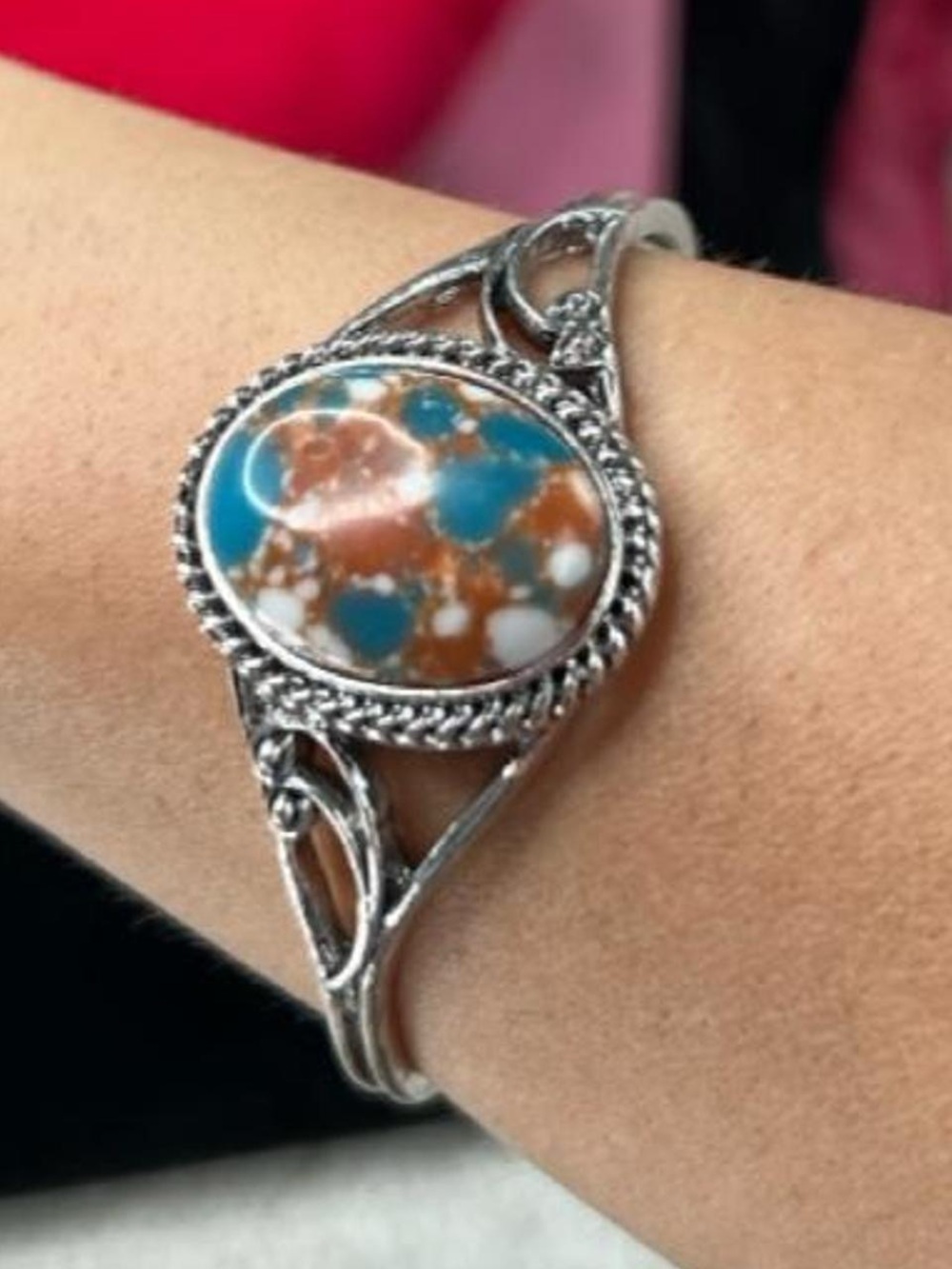Silver tone cuff bangle bracelet with turquoise blue and rust red marbled stone